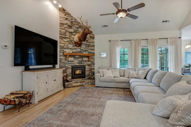 355 Night Lark, Campobello, SC 29322 - living room featuring high vaulted ceiling, a ceiling fan, light wood-style flooring, and a fireplace