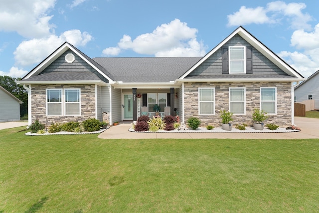 309 Old Kimbrell, Boiling Springs, SC 29316 - craftsman house featuring stone siding, a front yard, and roof with shingles