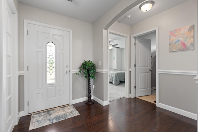 309 Old Kimbrell, Boiling Springs, SC 29316 - foyer featuring arched walkways, wood finished floors, baseboards, and a ceiling fan
