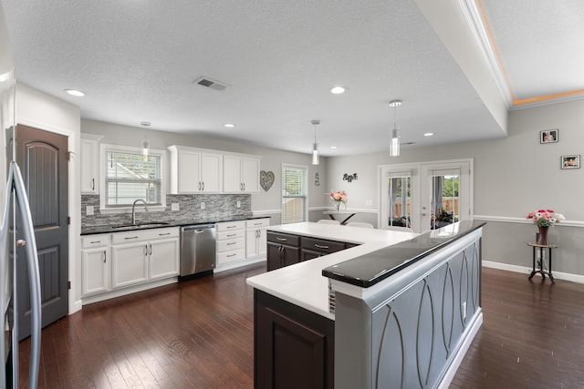 309 Old Kimbrell, Boiling Springs, SC 29316 - kitchen with dishwasher, a sink, backsplash, dark wood-style floors, and recessed lighting