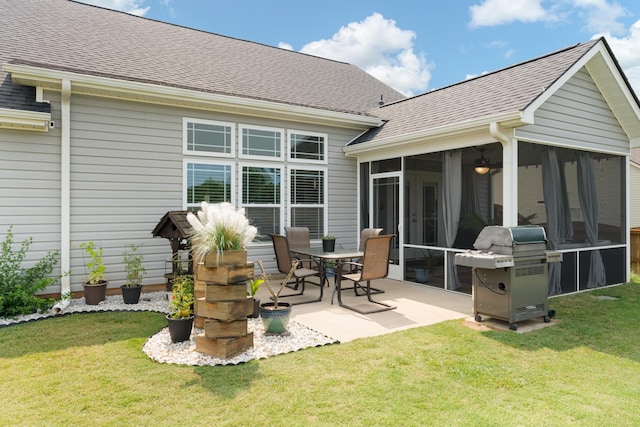 309 Old Kimbrell, Boiling Springs, SC 29316 - rear view of house with a sunroom, roof with shingles, a patio area, and a lawn