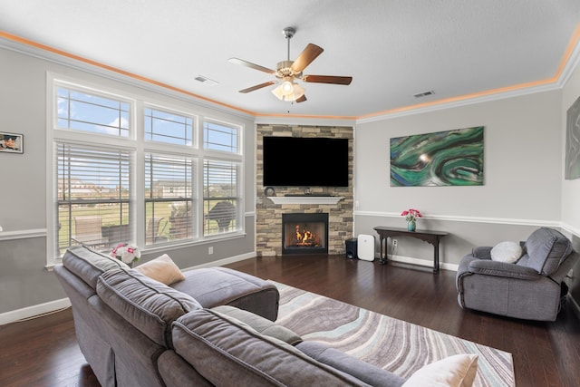 309 Old Kimbrell, Boiling Springs, SC 29316 - living room with ornamental molding, a ceiling fan, baseboards, a stone fireplace, and wood finished floors