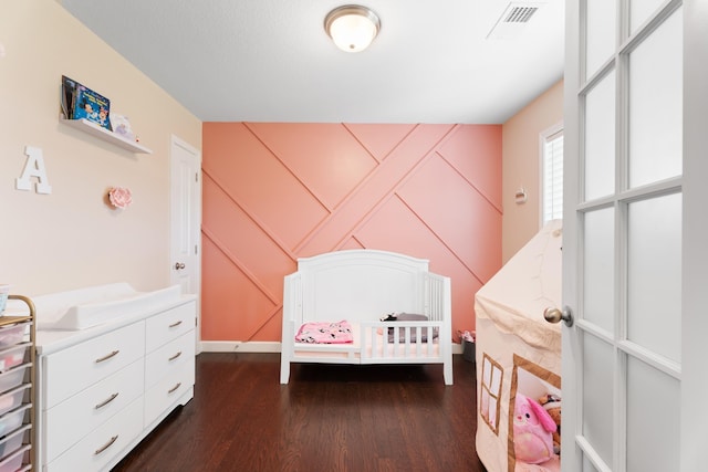 309 Old Kimbrell, Boiling Springs, SC 29316 - bedroom with dark wood-type flooring and a decorative wall