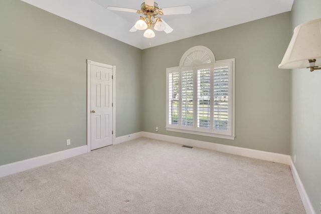 121 Commons, Spartanburg, SC 29302 - spare room featuring carpet floors, a ceiling fan, and baseboards