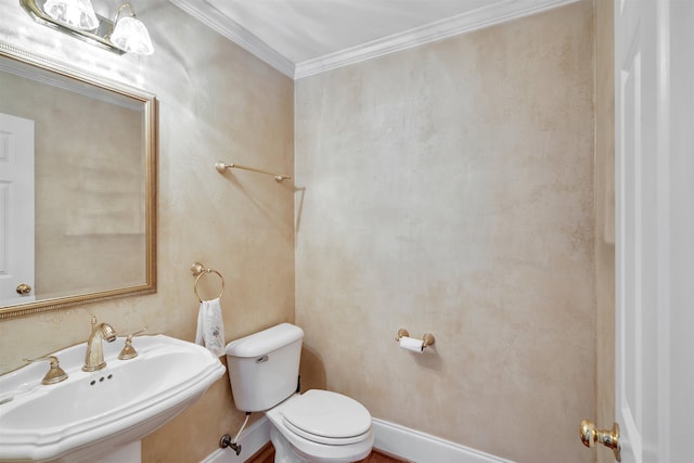 121 Commons, Spartanburg, SC 29302 - half bathroom with a sink, toilet, and ornamental molding