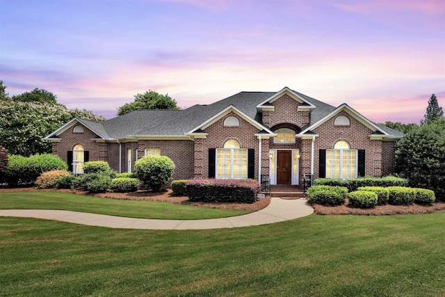 121 Commons, Spartanburg, SC 29302 - view of front of house with brick siding, a front yard, and a shingled roof
