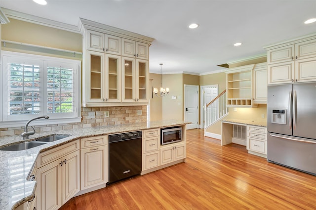 121 Commons, Spartanburg, SC 29302 - kitchen with appliances with stainless steel finishes, cream cabinetry, a sink, crown molding, and open shelves