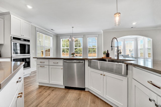 206 Hoss, Greenville, SC 29615 - kitchen featuring dishwasher, double wall oven, a sink, crown molding, and light wood finished floors