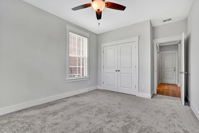 206 Hoss, Greenville, SC 29615 - unfurnished bedroom featuring carpet floors, baseboards, a closet, and a ceiling fan