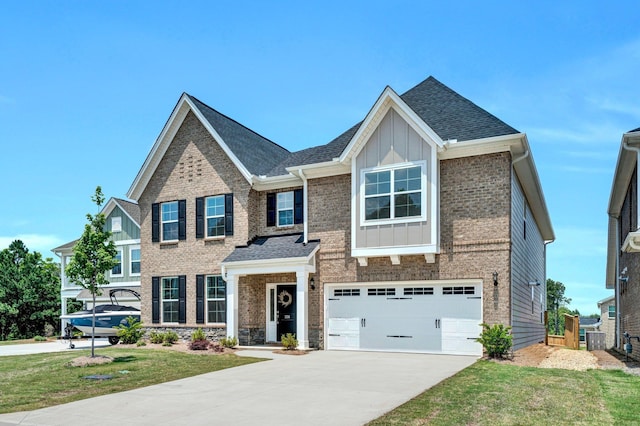 206 Hoss, Greenville, SC 29615 - view of front of property featuring board and batten siding, driveway, cooling unit, and a garage