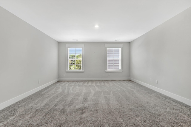 206 Hoss, Greenville, SC 29615 - empty room featuring baseboards and light colored carpet
