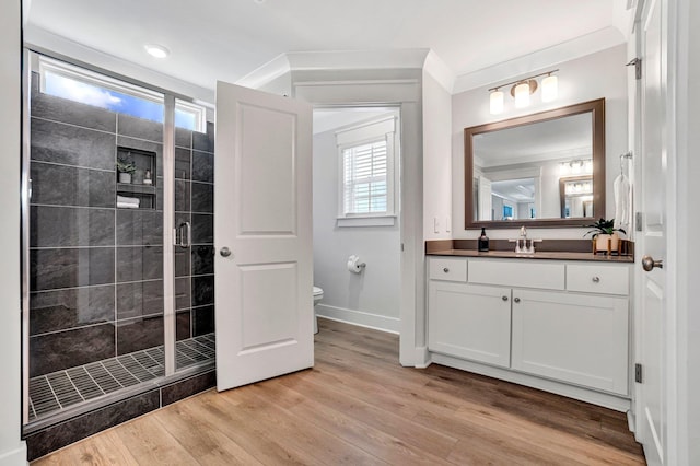 206 Hoss, Greenville, SC 29615 - bathroom with a shower stall, toilet, vanity, baseboards, and wood finished floors