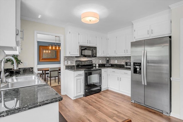16 Chariot, Simpsonville, SC 29681 - kitchen with black appliances, a sink, white cabinetry, decorative backsplash, and crown molding