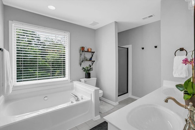 16 Chariot, Simpsonville, SC 29681 - bathroom featuring toilet, a garden tub, tile patterned floors, vanity, and baseboards