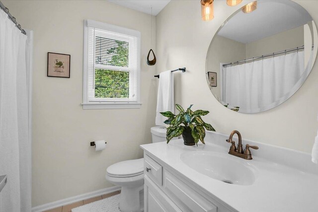 16 Chariot, Simpsonville, SC 29681 - bathroom with vanity, toilet, tile patterned flooring, baseboards, and curtained shower
