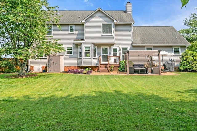 16 Chariot, Simpsonville, SC 29681 - back of property with a deck, a chimney, a lawn, an outdoor living space, and a shingled roof