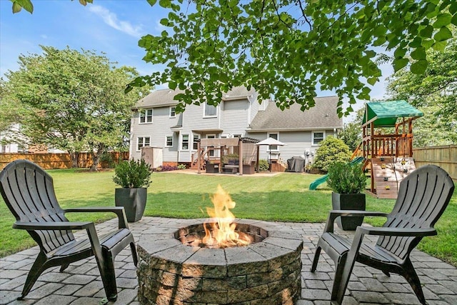 16 Chariot, Simpsonville, SC 29681 - view of patio featuring a fire pit, a playground, and a deck