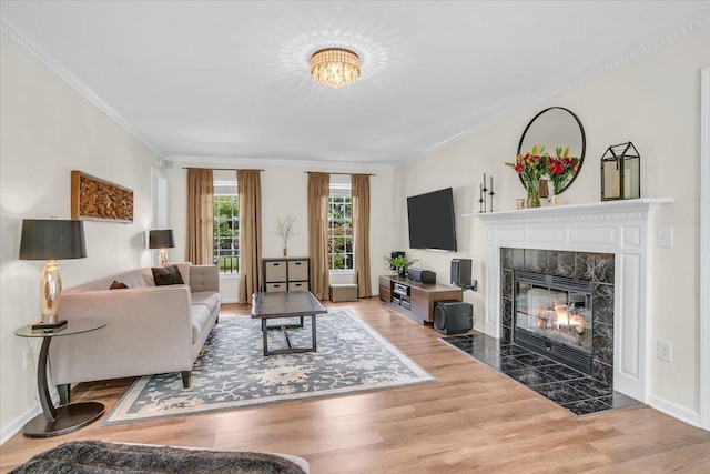 16 Chariot, Simpsonville, SC 29681 - living area with wood finished floors, a fireplace, crown molding, and baseboards