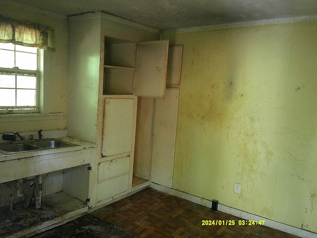 796 Neal, Woodruff, SC 29388 - kitchen with a sink, light countertops, and ornamental molding