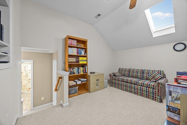 6533 NW Derby, Concord, NC 28027 - sitting room featuring an upstairs landing, vaulted ceiling, carpet floors, a skylight, and a ceiling fan