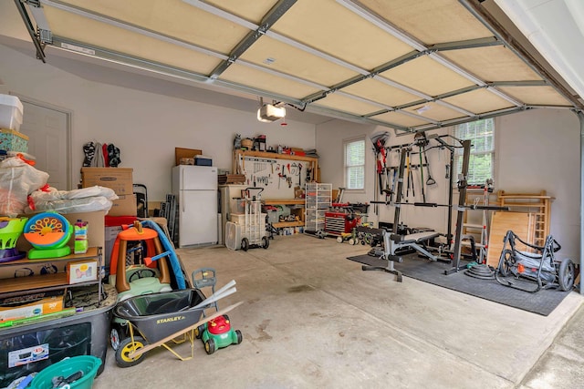 2030 Fasana, York, SC 29745 - garage with freestanding refrigerator and a garage door opener