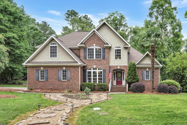 2030 Fasana, York, SC 29745 - view of front of home with brick siding, a front lawn, and roof with shingles