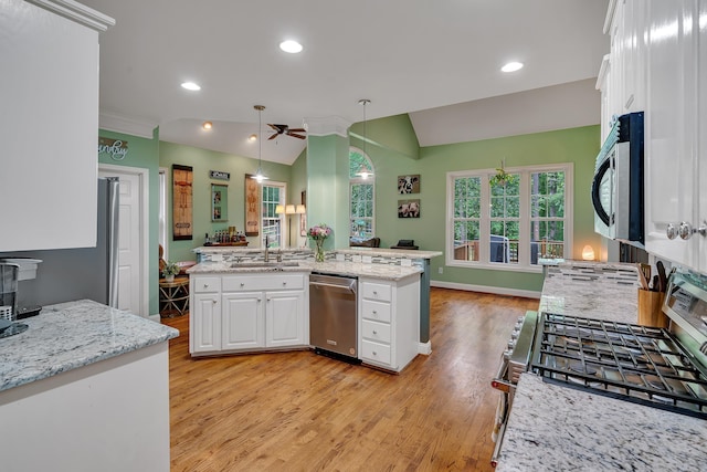 2030 Fasana, York, SC 29745 - kitchen with stainless steel appliances, light wood-style floors, white cabinetry, ceiling fan, and a sink