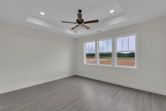 541 Bill Lattimore, Chesnee, SC 29323 - empty room with a tray ceiling, wood finished floors, recessed lighting, baseboards, and a ceiling fan
