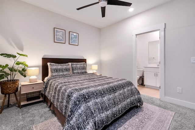 609 Cartmel, Greer, SC 29651 - bedroom with light colored carpet, ensuite bathroom, baseboards, and ceiling fan