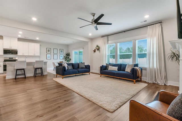 609 Cartmel, Greer, SC 29651 - living room featuring a ceiling fan, light wood-style flooring, recessed lighting, and baseboards