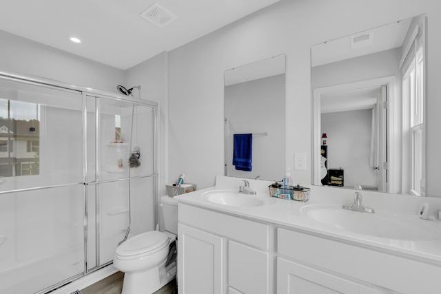 2097 Evanston, Wellford, SC 29385 - full bath with toilet, a stall shower, double vanity, plenty of natural light, and recessed lighting