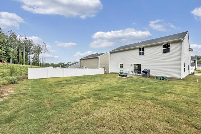 2097 Evanston, Wellford, SC 29385 - back of property with an outdoor fire pit and a patio area