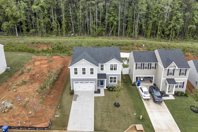 2097 Evanston, Wellford, SC 29385 - aerial view of property and surrounding area featuring a forest
