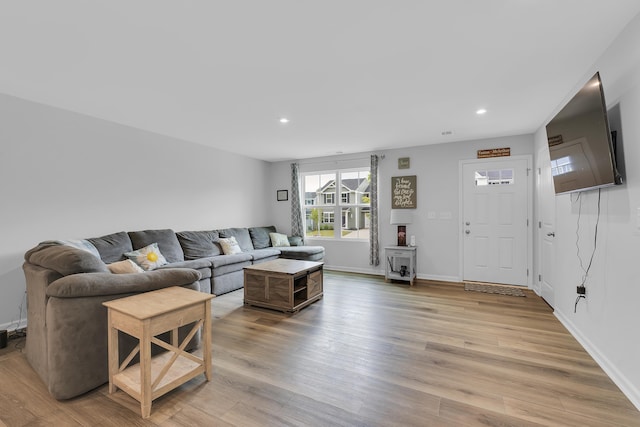 2097 Evanston, Wellford, SC 29385 - living area with light wood finished floors, recessed lighting, and baseboards
