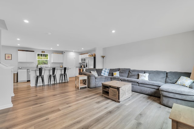 2097 Evanston, Wellford, SC 29385 - living area with light wood-style flooring and recessed lighting