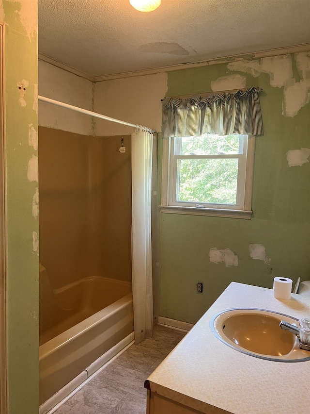 109 Berry, Boiling Springs, SC 29316 - bathroom with shower / bathtub combination with curtain, vanity, and a textured ceiling