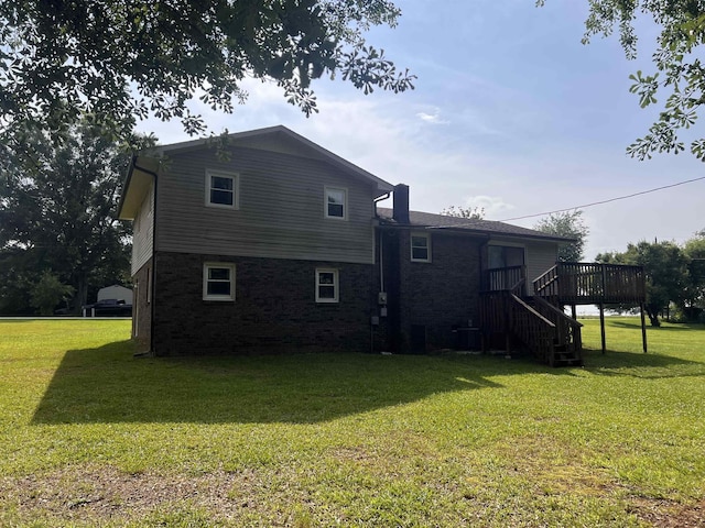 109 Berry, Boiling Springs, SC 29316 - back of property featuring brick siding, a wooden deck, and a yard