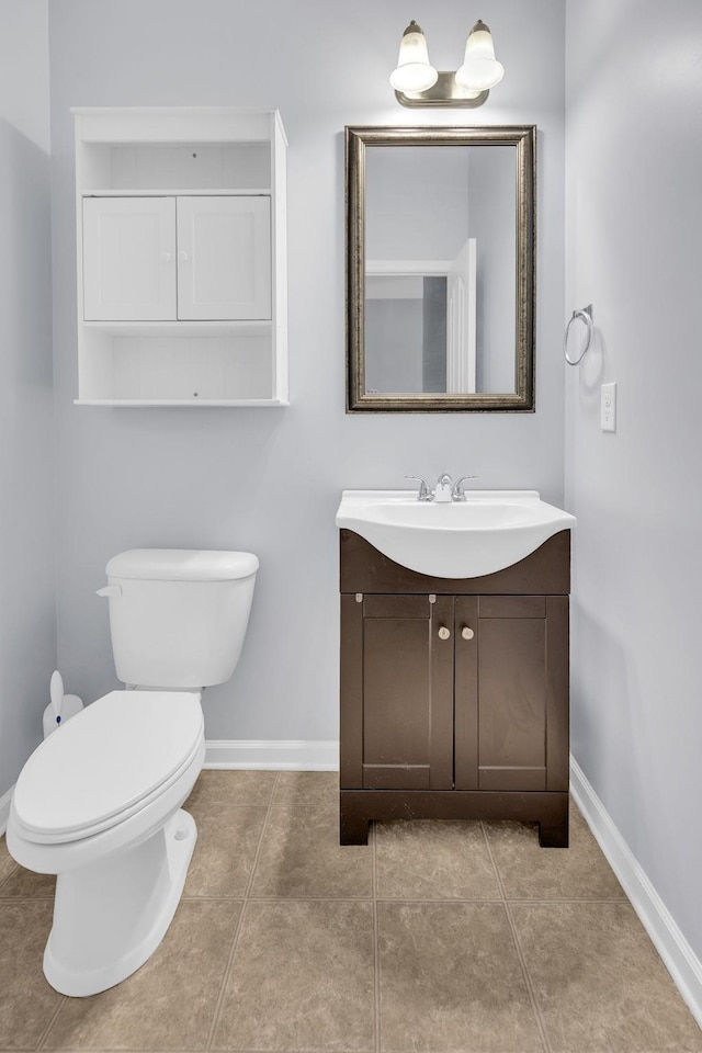 241 Hartleigh, Lyman, SC 29365 - bathroom with vanity, toilet, baseboards, and tile patterned flooring