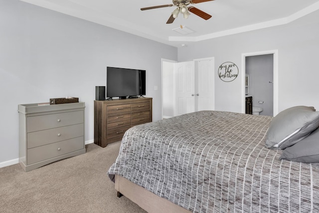 241 Hartleigh, Lyman, SC 29365 - carpeted bedroom featuring a tray ceiling, baseboards, a ceiling fan, and ensuite bathroom