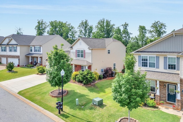 241 Hartleigh, Lyman, SC 29365 - view of front facade featuring driveway, a front yard, and a garage