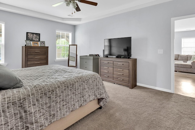 241 Hartleigh, Lyman, SC 29365 - bedroom featuring light carpet, multiple windows, baseboards, and ceiling fan