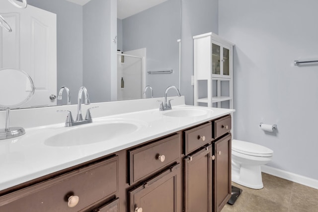 241 Hartleigh, Lyman, SC 29365 - bathroom with double vanity, a shower stall, toilet, tile patterned flooring, and baseboards