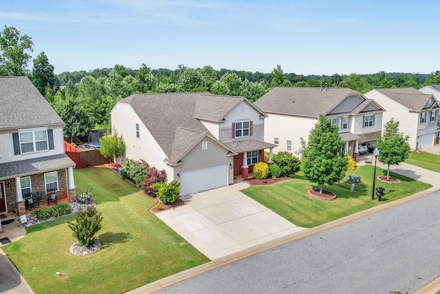 241 Hartleigh, Lyman, SC 29365 - view of front of home with concrete driveway, a residential view, and roof with shingles