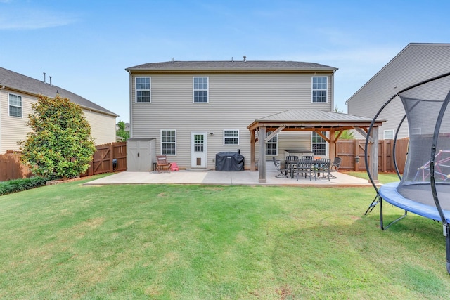 241 Hartleigh, Lyman, SC 29365 - back of property featuring a trampoline, a gazebo, and a patio area