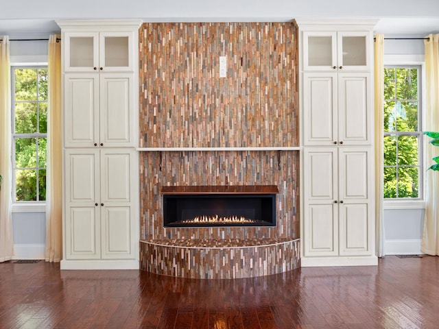 220 Fincher, Pauline, SC 29374 - unfurnished living room featuring baseboards, hardwood / wood-style flooring, and a brick fireplace