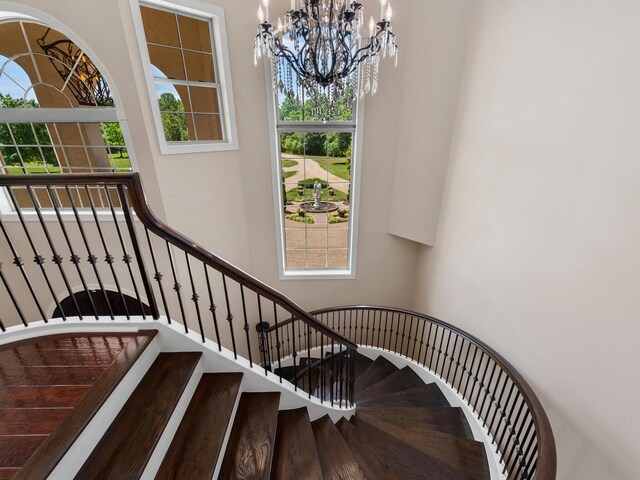 220 Fincher, Pauline, SC 29374 - stairs featuring a chandelier and a towering ceiling