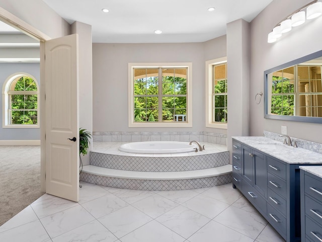 220 Fincher, Pauline, SC 29374 - full bathroom featuring vanity, a garden tub, marble look tile flooring, and recessed lighting