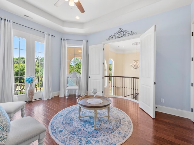 220 Fincher, Pauline, SC 29374 - living area with wood finished floors, baseboards, ceiling fan, a chandelier, and a tray ceiling