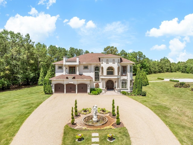 220 Fincher, Pauline, SC 29374 - mediterranean / spanish house with stucco siding, driveway, a front yard, and view of wooded area