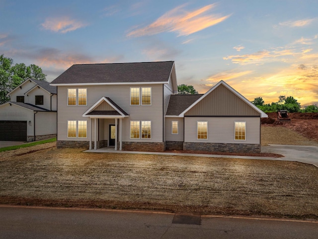 224 W Clark, Inman, SC 29349 - view of front of property featuring stone siding, roof with shingles, and an outdoor structure
